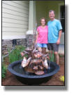 Twayne and his wife from Pensacola with new copper water fountain and sugar kettle
