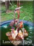 Small copper egret fountain
