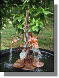 Lance One accent copper fountain with orchids