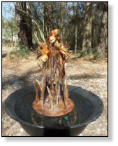 Copper iris dripping fountain