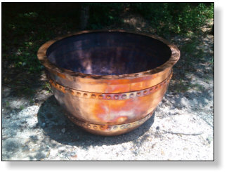 Copper urn we made for some folks in California. About 26" high and about 45" wide at top.