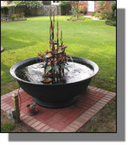 Nice brick pad for fiberglass Louisiana sugar kettle and copper fountain