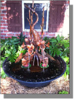 Nice standing heron copper fountain in Alexandria, LA