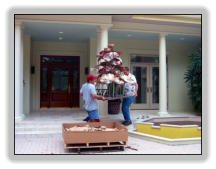 Some guys installing one of the two copper lotus fountains in Sarasota