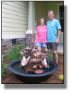 Twayne and his wife from Pensacola with new copper water fountain and sugar kettle