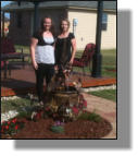 Lance One owners with fountain in clay pot