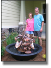 Twayne and his wife from Pensacola with new copper water fountain and sugar kettle