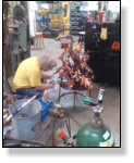 Buddy working on copper heron fountain