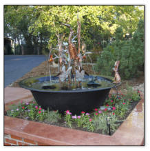 Custon piece with Peter Rabbit on the rim of kettle and frog on lily pad Installed custom version of Cypress Heron in Redding, CA with Peter Rabbit addition