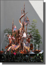 Big copper heron fountain in 7 foot cast iron kettle