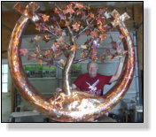 Buddy with Sanctuary at Rye sign before shipping.